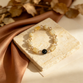 Black bead and citrine bracelet